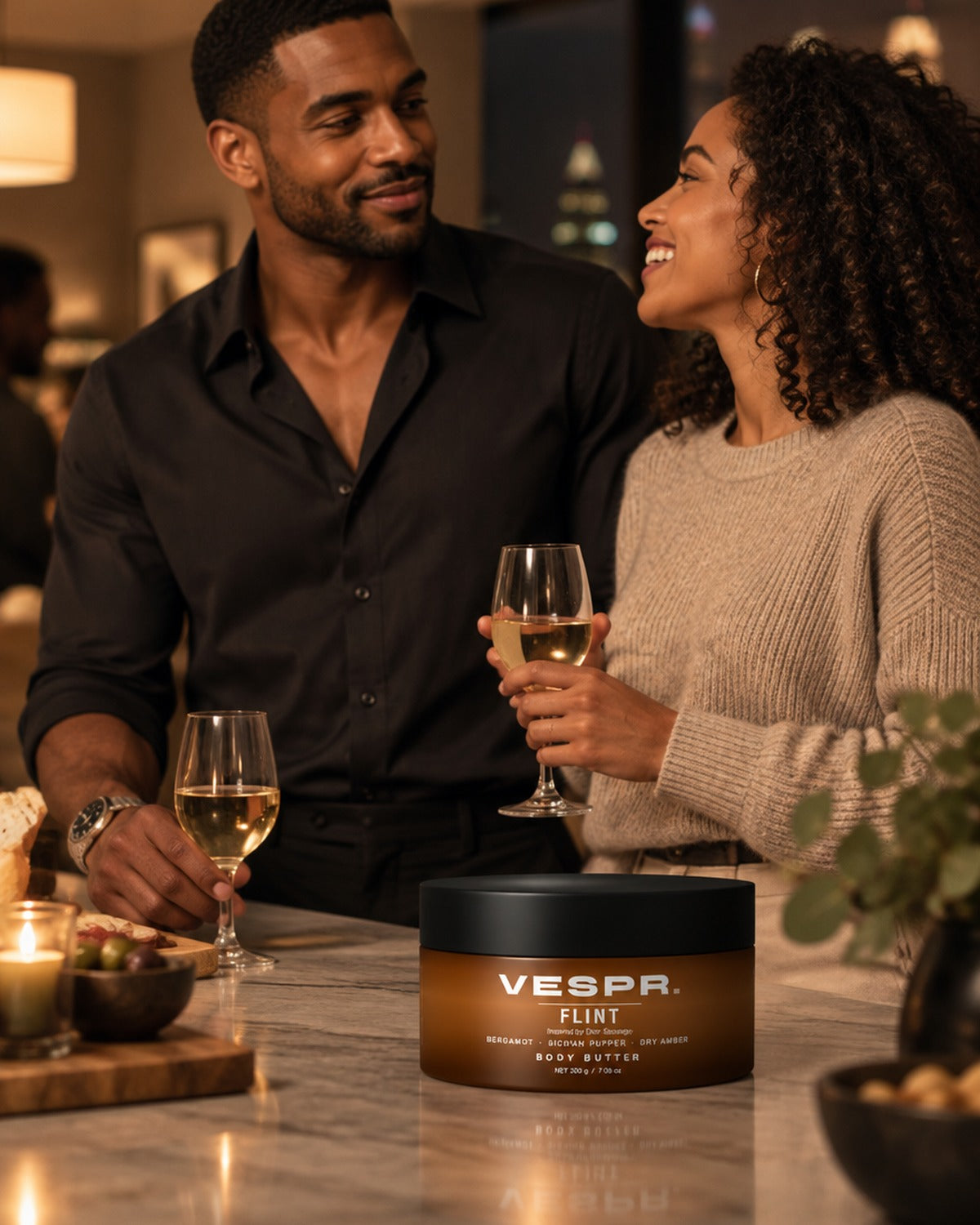 A VESPR body butter jar on a bathroom counter before a night out